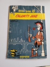 Lucky Luke n°30 – Calamity Jane (Dupuis 1970, dos bois) – Édition ancienne – Bon