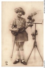ASJP5-0240-GIRL - Child playing guitar