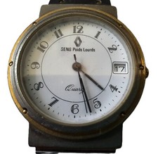 Montre en acier et doré à