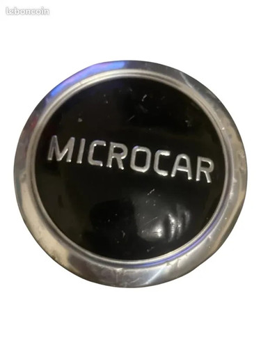 Cache jante microcar