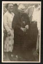 Curious document. Senior woman with hearing aid. circa 1940