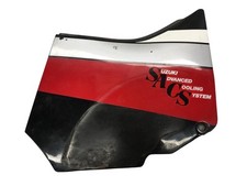 Cache carenage sous selle