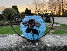 Vase boule en verre moucheté