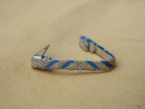 Fixe ruban rappel boutonnière