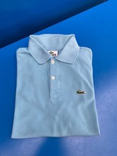 Polo Lacoste sport TBE taille 14 ans ou 164 cm Bleu ciel mixte