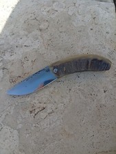 Couteau pliant deux clous