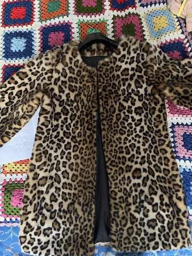 Manteau fausse fourrure