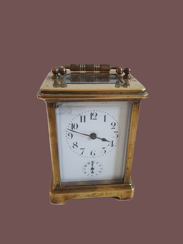 Pendule voyage - de,
