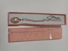 collier fantaisie pendentif  forme ovale rose nacré  en résine et paillettes