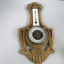 old barometer thermometer peter on carved wood