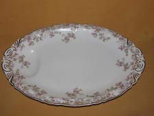 Plat de service viande porcelaine Haviland début XXème décor de petites roses