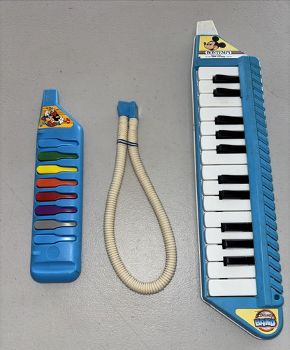 Two vintage disney bontempi - two,