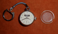 Porte-clés MINI MONTRE 15 RUBIS LA CIMBALI REIMS - 27 mm diamètre ( abîmée )