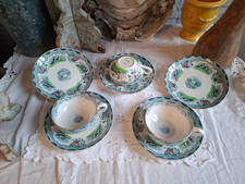 3 Tasses / 5  Soucoupes