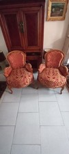 Paire de fauteuils à coussin