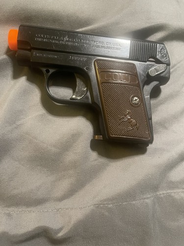 Used colt spring loaded - .45,