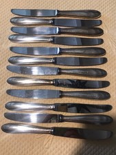 12 COUTEAUX À FROMAGE MÉTAL