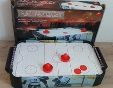 Petit air-hockey de table pour