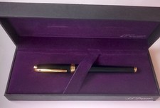 ST DUPONT STYLO BILLE ROLLER LAQUE NOIRE ET DORE AVEC BOITIER TRES BON ETAT