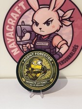 Écusson Auto-Aggripant, Agent