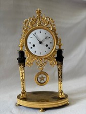 Pendule époque Empire retour