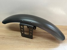 UN GARDE BOUE AVANT MOTO