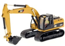 DIECAST MASTERS, Pelle sur chenilles CATERPILLAR 320D avec conducteur et boit...