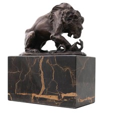 Statue de bronze lion serpent