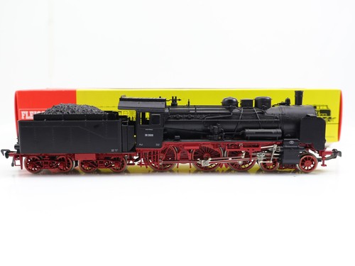 Locomotive vapeur - à,