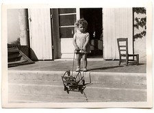 Little girl with stroller