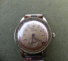 Montre DAMY Besançon, dateur