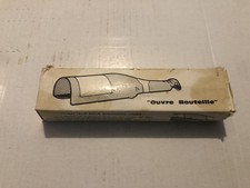 Bottle opener / head cap extractor