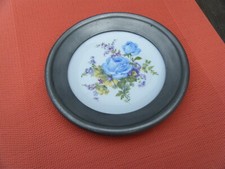 porcelain and pewter plate