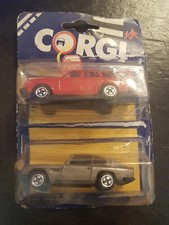 CORGI VOITURES ASTON MARTIN DB6  VOLVO 245 DBL BLISTER