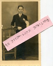 PHOTO OF A HANDSOME BOY IN COMMUNION COSTUME