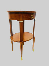 Gueridon ovale en bois de placage et filet de bois noir XX siècle