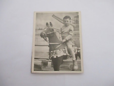 OLD PHOTOGRAPH CHILD ON A TOY ANTIQUE HORSE