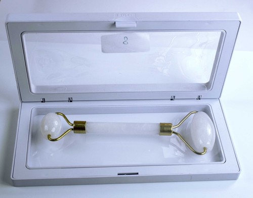 Rouleau massage facial - de,