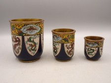 Trois vases anciens en émaux