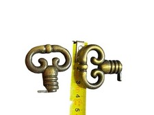 OLD VINTAGE 2 FAKE KEY FURNITURE HOLDER DECORATION BRONZE BRASS OR ALUMINUM
