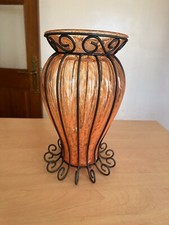 ancien vase en verre et fer
