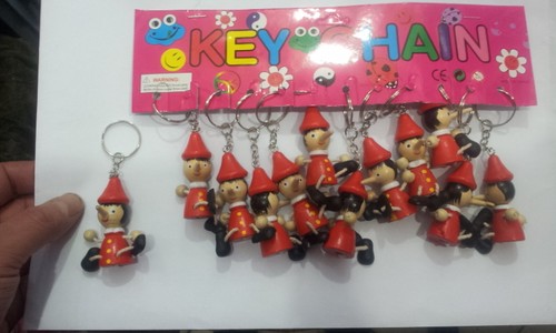 Porte clés pinocchio bois - 12,