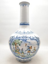 Vase pansu en faïence signé