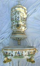 mustard wall fountain and its faience basin