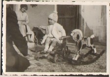 CHILD PHOTO WITH TOYS WOODEN HORSE TRAILER