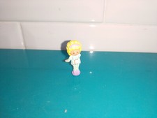 Polly pocket figurine doll