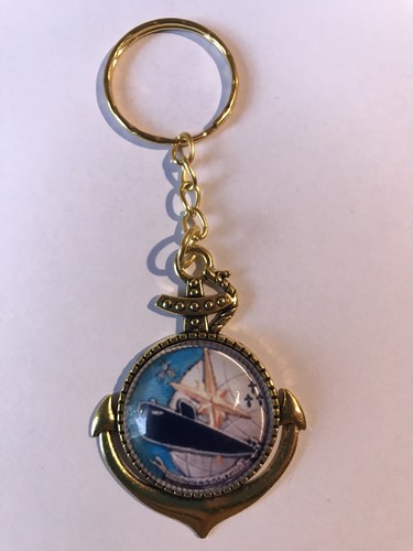 Porte clefs clé métal doré