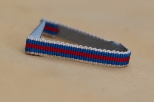 Fixe ruban rappel - , boutonnière