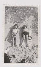 old photo ?️ two girls Knokke 1935 beach sand and bricks