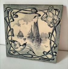 Carreau ancien en faïence de